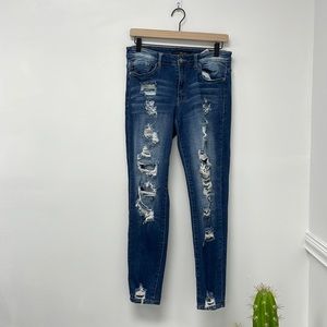 Distressed denim jeans